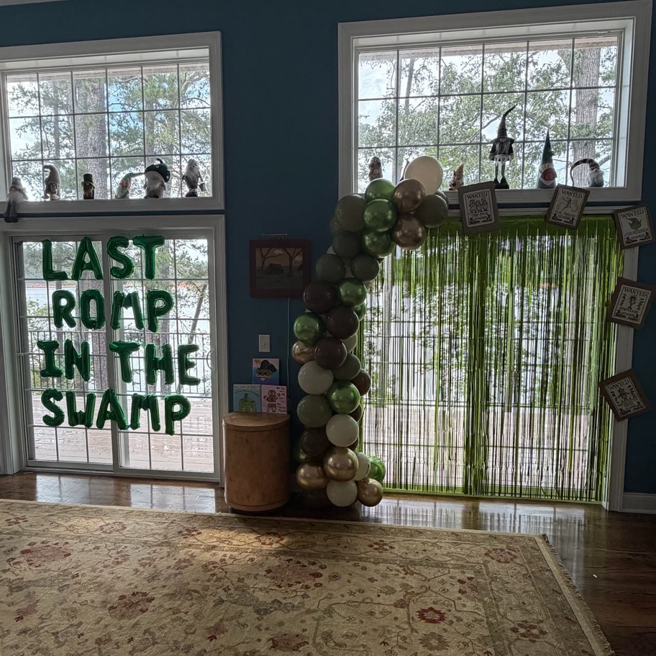 Green and gold balloon column for a swamp-themed bachelorette party